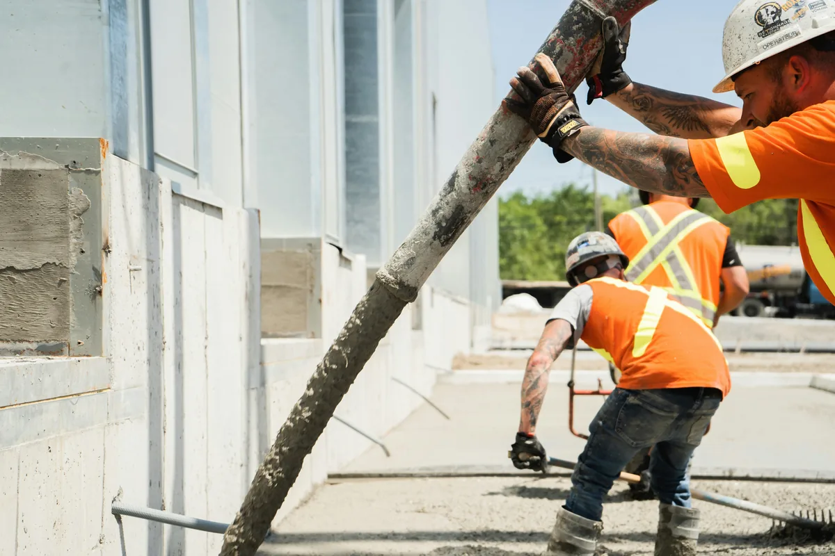 Hand finishing fresh concrete