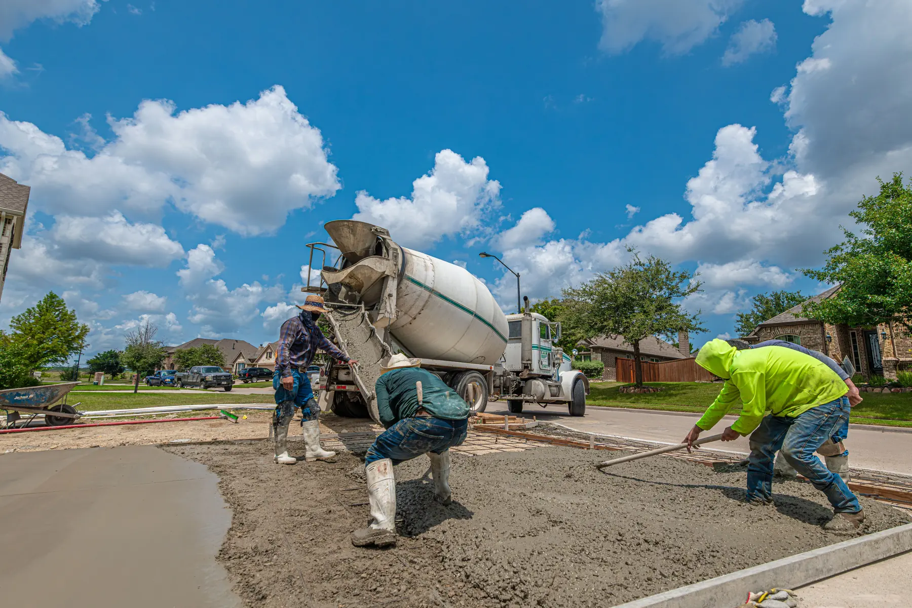 Concrete crew placing a driveway in Victoria Texas